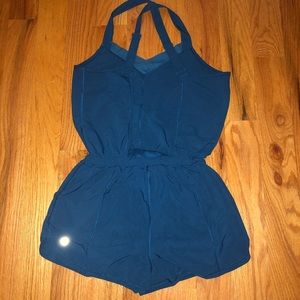 Lululemon • blue romper with open back sz 4